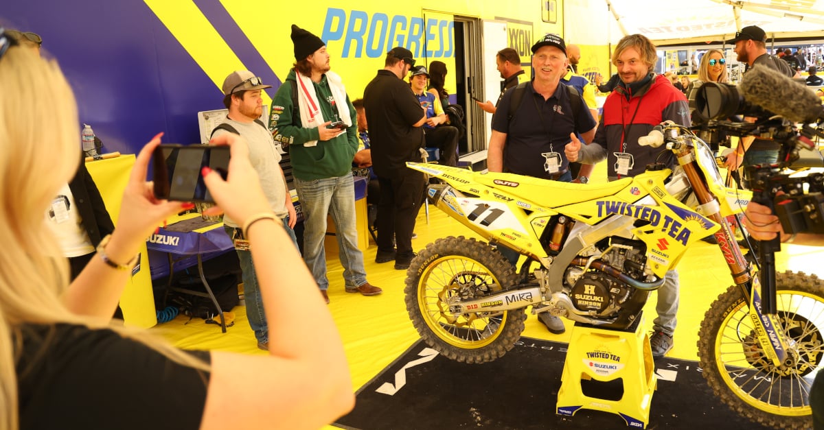 Fans getting an up-close look of an SMX motorcycle.